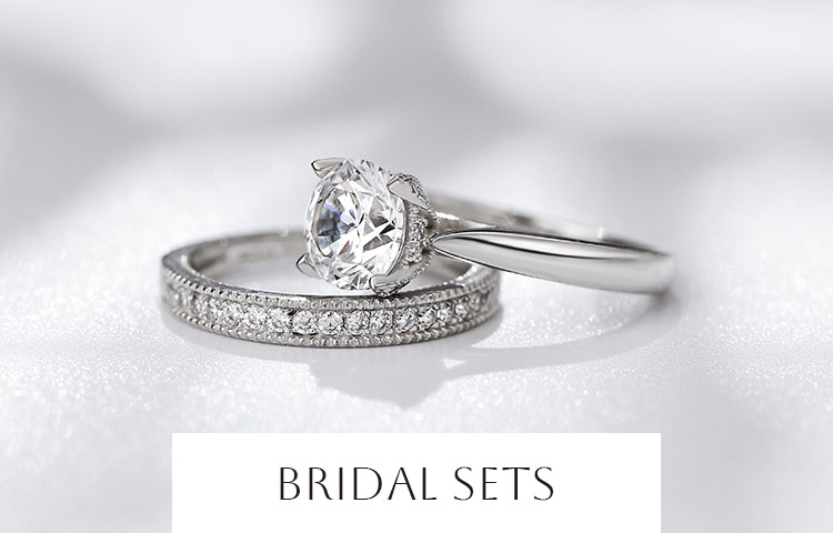 Jeulia Three Stone Round Cut Enhancer Sterling Silver Ring Set